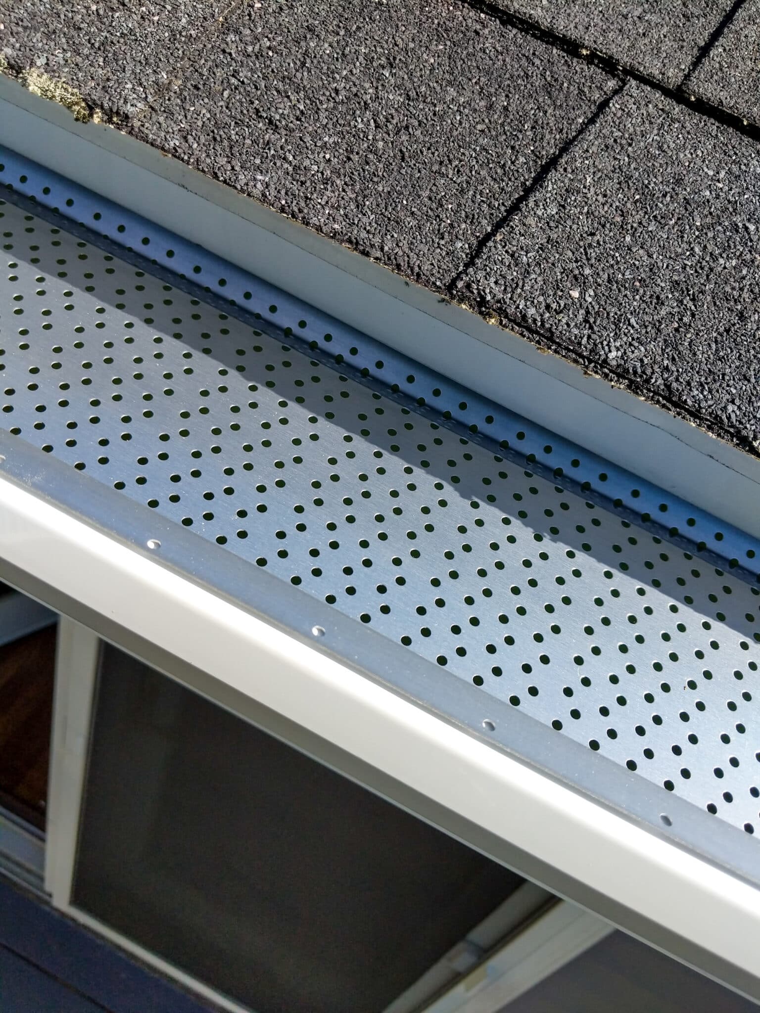 Closeup of gutters with leaf guard
